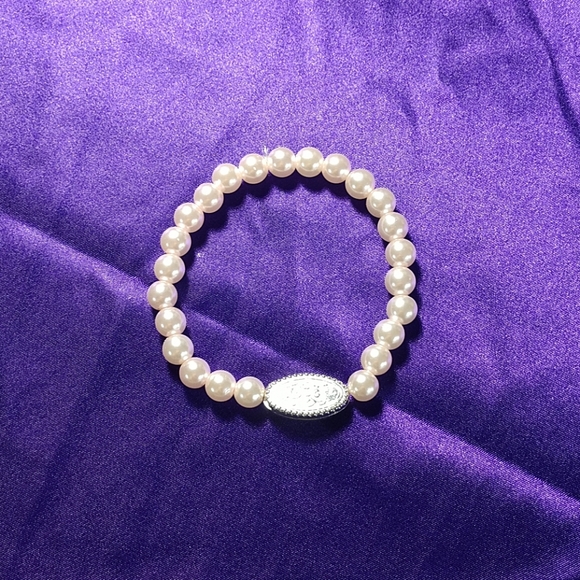 pink bracelet with pretty metal piece - Picture 5 of 5
